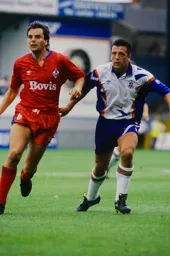 Darron McDonough chasing Oldham’s Graham Sharp
