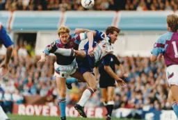 Phil Gray in a tussle with Villa's Kevin Richardson