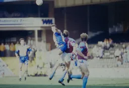Phil Gray gets above the Villa defence