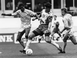 Mick Harford taking on Viv Anderson