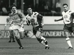 Ceri Hughes keeping up with Peter Beardsley wearing Town’s second kit
