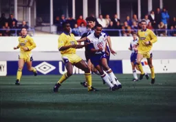 Brian Stein goes past his man