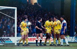 Mick Harford listening into the Referee’s wise words