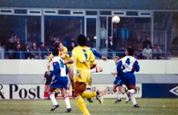 Chris Kamara watches the ball sail over his head