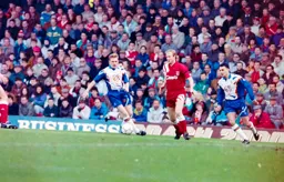 Mark Pembridge beaten to the ball by Mark Wright