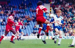 Mark Pembridge in a midfield clash
