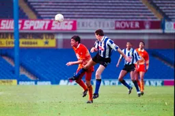Mick Harford unable to get his head to the ball