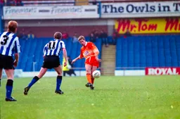 Julian James feeds the ball through