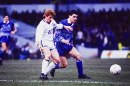 Richard Harvey winning the ball from Gordon Strachan