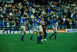 David Pleat out to console his player after relegation