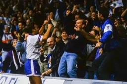 Scott Oakes celebrates with the crowd