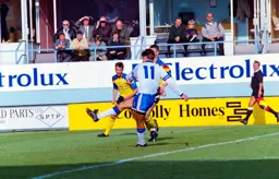 Scott Oakes shoots from just inside the box