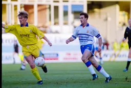 Phil Gray chasing down the ball
