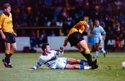 Phil Gray with a sliding tackle