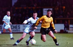 Steve Claridge about to get a tackle in