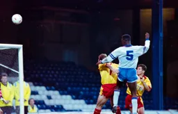 Marvin Johnson heads for goal