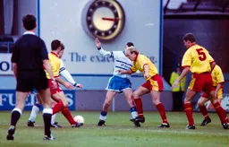 Steve Claridge is tackled by ex Town defender Paul Futcher