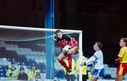 Steve Claridge watches the keeper flying high