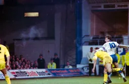 Phil Gray glances the ball into the Millwall net