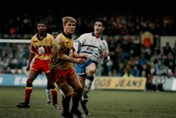 Ceri Hughes chips the ball forward
