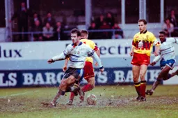 Phil Gray runs past the ball