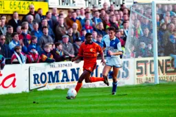 Ian Benjamin holds off his marker