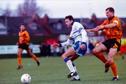 John Dreyer holding off Wolves Steve Bull