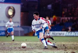 Ceri Hughes darting through with the ball