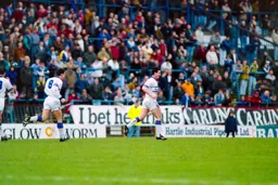 Ceri Hughes on a celebration run after scoring