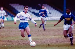 Phil Gray first to the ball