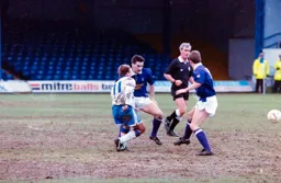 David Preece in a midfield battle