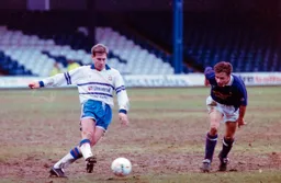 Julian James passes the ball upfield