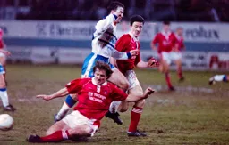 Phil Gray has the ball taken from him