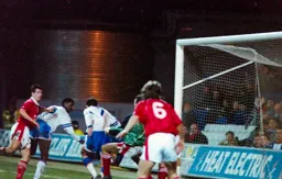 Ian Benjamin gets a header on goal