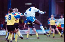 Marvin Johnson gets his head to the ball