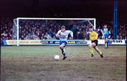 Julian James striding forward