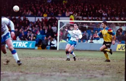 Ceri Hughes with a through pass