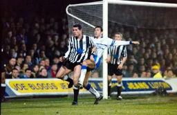 John Dreyer tries to get his foot in first