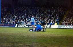 Alec Chamberlain keeps watch over an injured colleague