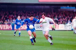 Paul Telfer holds off the Tranmere defender