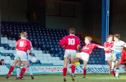 Phil Gray heads for goal