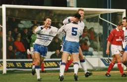 Kerry Dixon takes the congratulations of his teammates