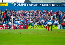 Alec Chamberlain cannot stop the winner from Aspinall’s spot kick