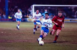 Phil Gray lays the ball off