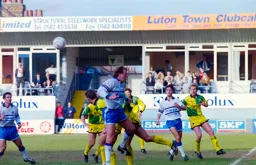 Kerry Dixon trying to make contact with a corner