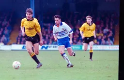 Jason Rees chasing the Cambridge defender