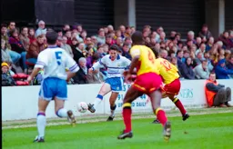 Paul Telfermoves the ball down the line