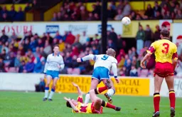 Kerry Dixon gets his head to the ball