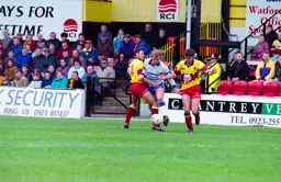 Kerry Dixon is sandwiched