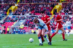 Julian James shielding the ball